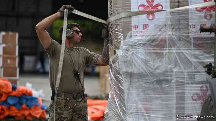 US troops unload China's only known aid flight to earthquake-ravaged Venezuela as Americans surge relief