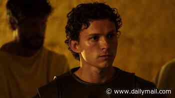 Tom Holland is branded 'comic book basic' and 'wrong for the role' of Telemachus as The Odyssey reviews criticise Brit actor's 'American accent'