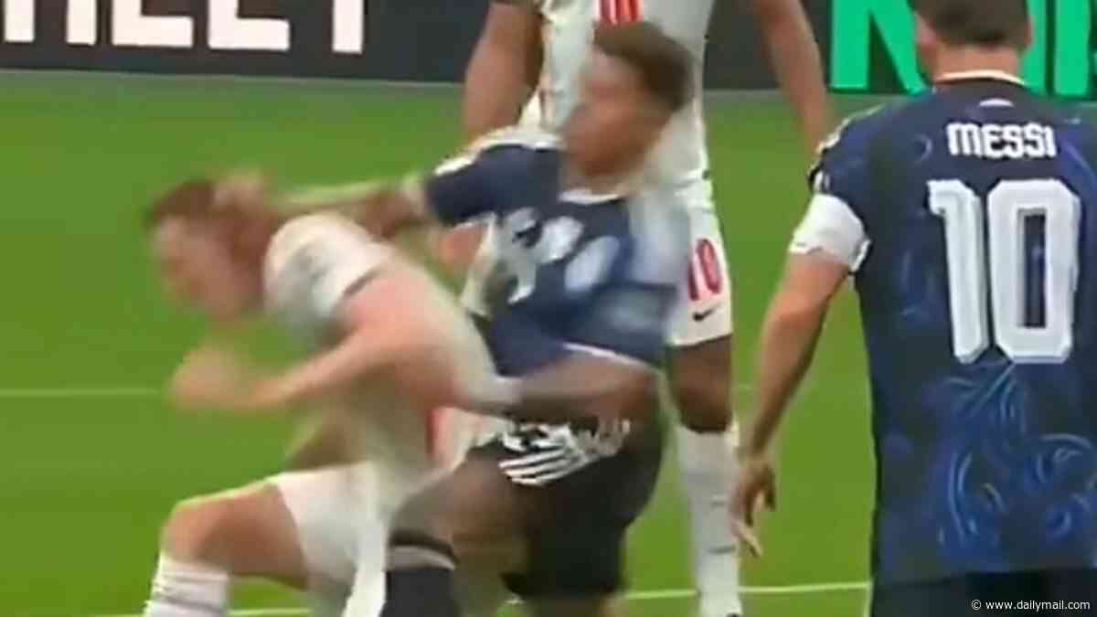 Should Argentina's goalscorer have been on the pitch to break England's hearts? Furious Three Lions fans claim Enzo Fernandez should have been sent off for brutal third-minute elbow in ANOTHER lucky escape amid 'rigging' accusations