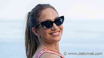 Jennifer Lopez, 56, shows off her toned abs in a bold crop top as she continues her European summer of fun in Sicily