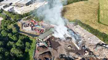 Massive pile of waste goes up in flames at recycling centre and residents told to keep windows closed - live updates