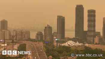 Orange haze from Canada wildfires seen in Ontario and northern US