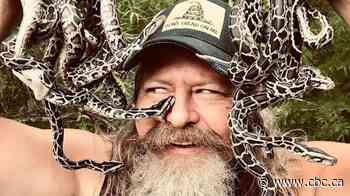 A dead python will get you a free pizza at this man's restaurant. Yes, it's in Florida