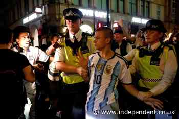 Argentina fan swarmed by England supporters in central London rescued by police