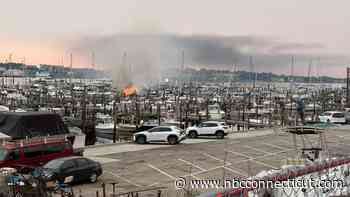 Two boats catch fire at Burr's Marina in New London