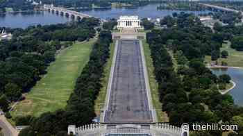 Drained Reflecting Pool shows liner more grey than blue