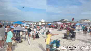 Blue Angels’ low flyover sends beach chairs and umbrellas flying