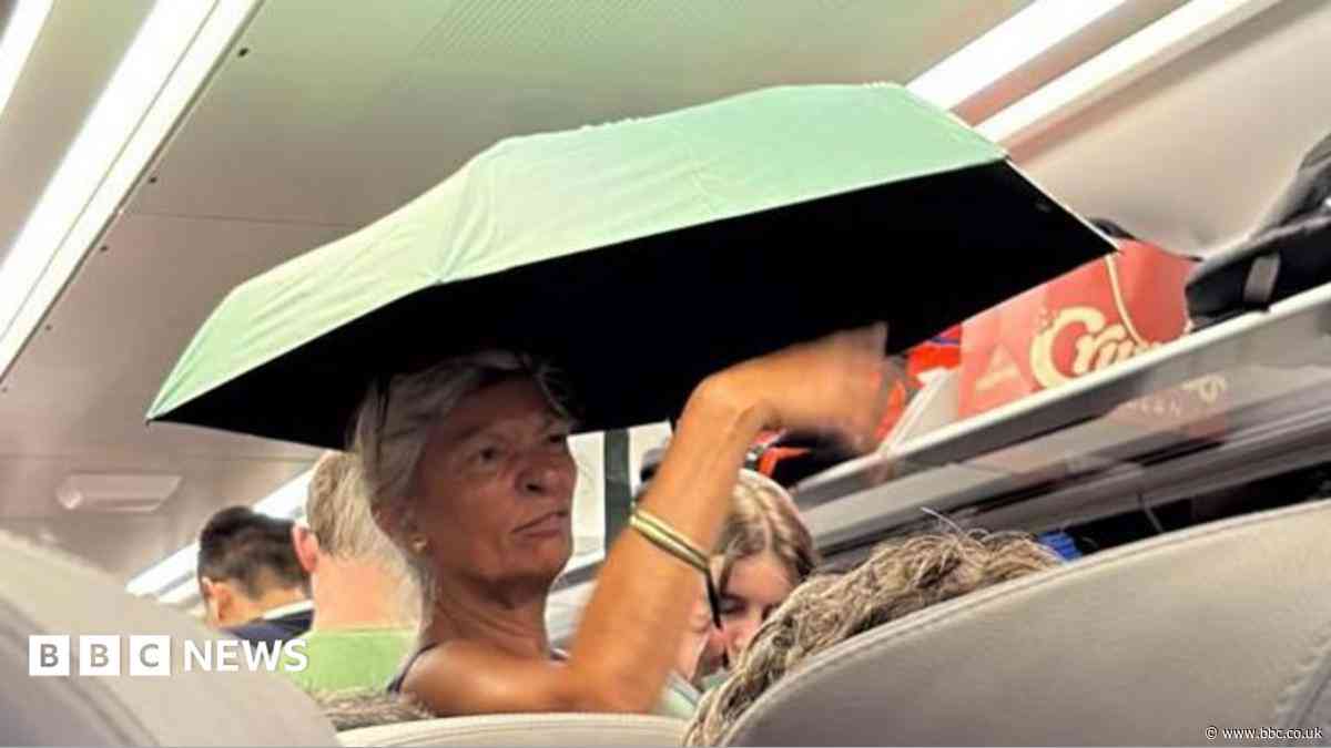 Broken air con leaves train 'raining inside'