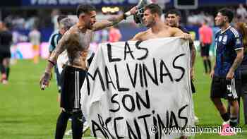 Argentina stars face nervous wait over potential ban for holding up 'Malvinas' banner after win over England as FIFA reveal they will 'decide further steps'
