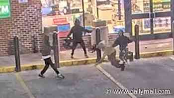 Appalling moment six-strong mob clobbers elderly man outside 7-Eleven store in crime-ridden Baltimore