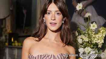 Daisy Edgar-Jones dazzles in a strapless gown with a racy thigh-high slit as she hosts a starry British Vogue dinner
