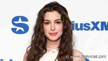 Anne Hathaway, 43, shows off her bare baby bump in a cropped top during The Odyssey press tour… after revealing surprise pregnancy