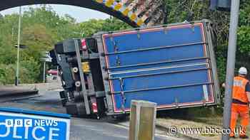 Trains delayed as lorry crashes into railway bridge