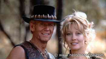 Crocodile Dundee star looks world away from her famous character amid romantic Spanish getaway with husband