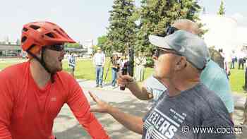 Edmontonians who oppose bike lanes cross paths with advocates in fiery standoff