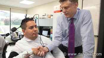 Man, 48, paralysed from the chest down can now feed himself thanks to game-changing brain implant that's boosted his arm strength by 86%