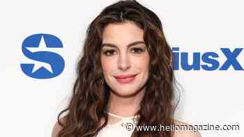 Pregnant Anne Hathaway unveils bare baby bump in daringly cropped 'finale' two-piece
