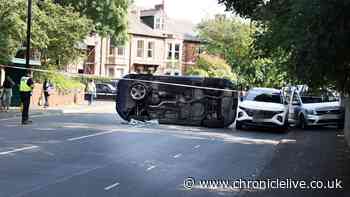 Three in hospital after car overturns in Benton collision