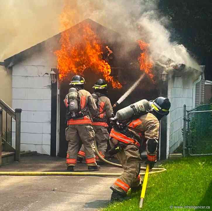 Belleville firefighters quickly extinguish a fully involved garage blaze