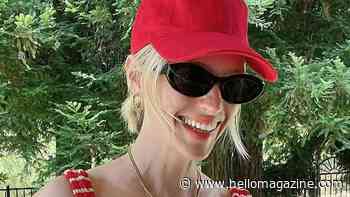 'Goddess' January Jones sizzles in plunging Baywatch-worthy red swimsuit