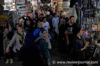 US strikes bridges and collapses a tower at a key port as its Iran campaign expands