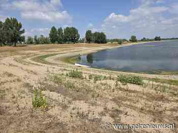 Lage waterstand Rijn legt rivierbodem bloot