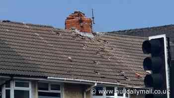 Part of Anlaby Road remains closed after man takes to rooftop