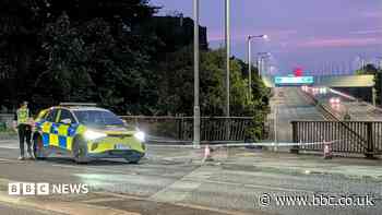 Two women in hospital after car crashes off bridge onto M8