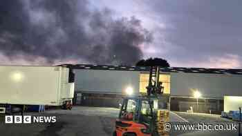 Fire crews still tackling recycling centre blaze a day later