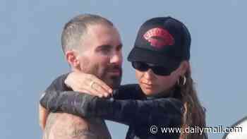 Adam Levine and Behati Prinsloo flaunt romance on yacht trip... four years after sexting scandal