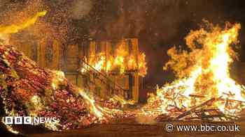 Firefighters leave scene of huge woodchip blaze