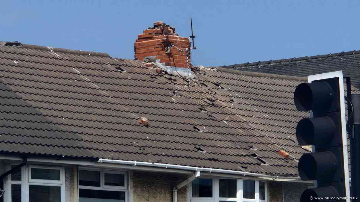 Emergency Services on Anlaby Road after man takes to rooftop