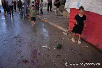 An Israeli strike on a funeral in Gaza kills 7 people and wounds 22, a local hospital says