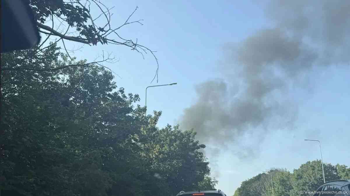 Black smoke billows across sky in Maghull as caravans go up in flames