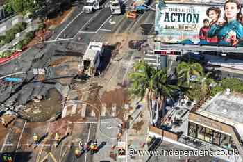Century-old pipe bursts flooding famed Sunset Boulevard in Los Angeles