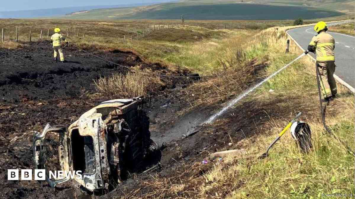 Car crash fire ignited moorland blaze