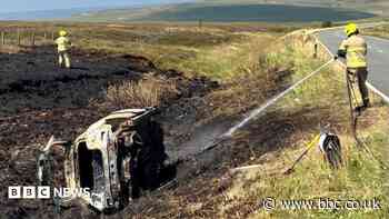 Car crash fire ignited moorland blaze