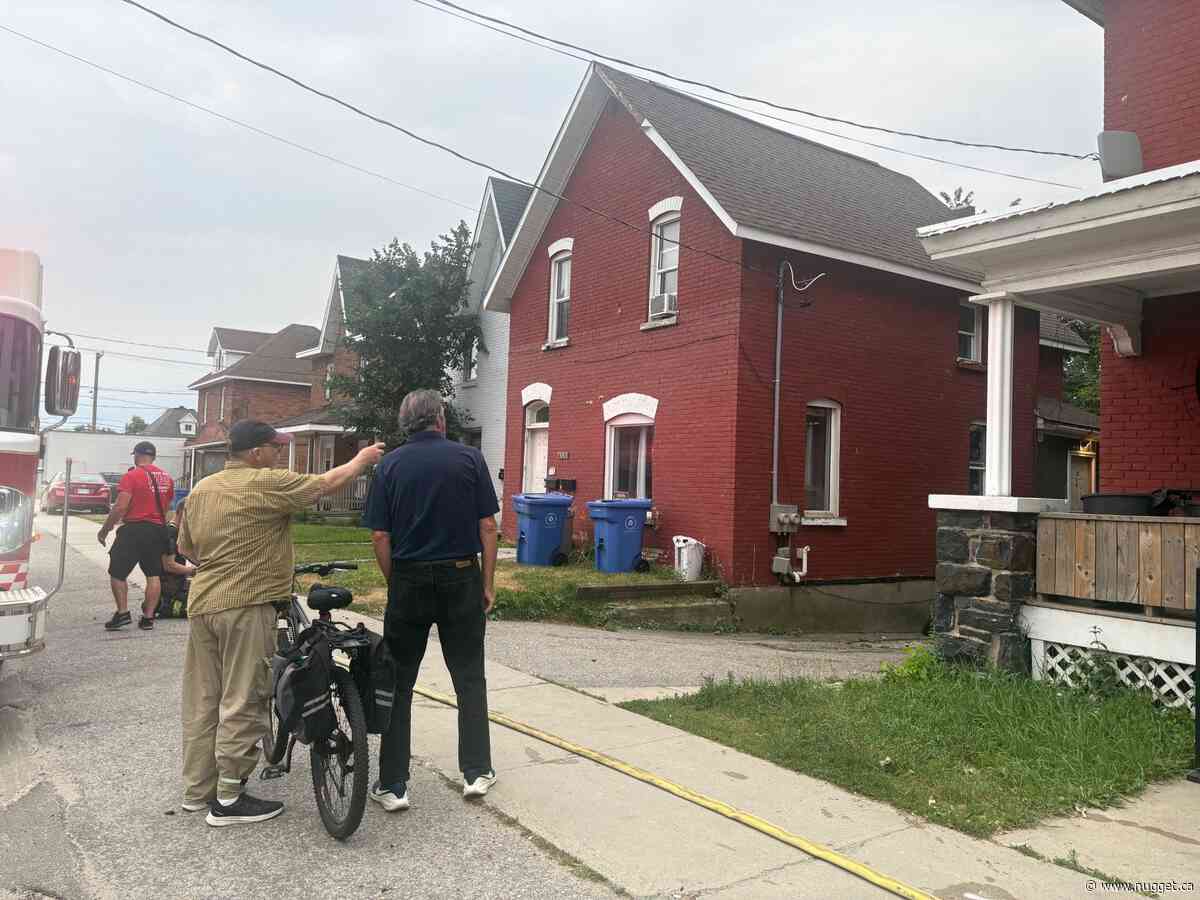 Motorcycle fire spreads to shed, trees before firefighters stop blaze - PHOTOS