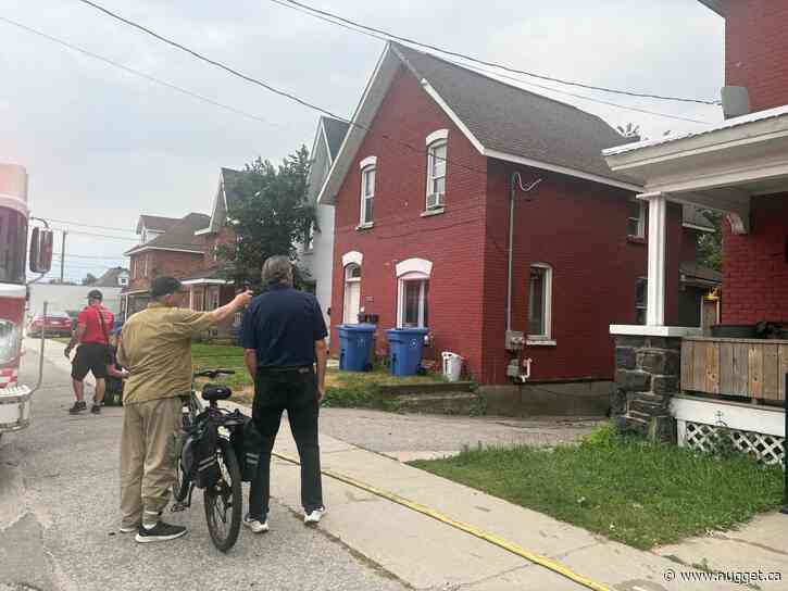 Motorcycle fire spreads to shed, trees before firefighters stop blaze - PHOTOS