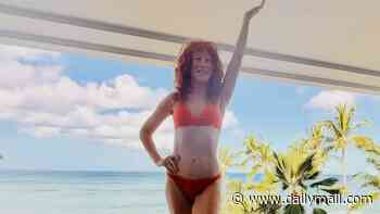 Kathy Griffin, 65, shows off her incredible bikini body during Hawaiian getaway... after younger 'boyfriend' stunt