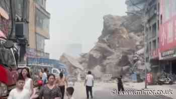 Eight killed and thousands evacuated after huge landslide in 'China megacity'