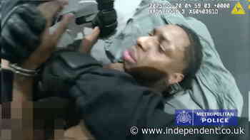 Watch: £4m crypto fraudster handcuffed in bed after impersonating police