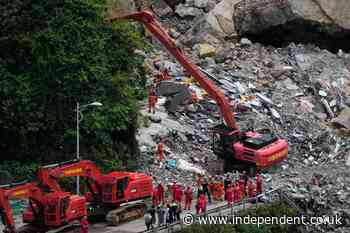 Rescuers in China race to find survivors after landslide kills at least 8