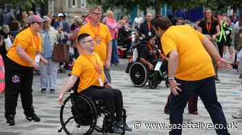 Scores join joyful Stockton flashmob in record-breaking event to celebrate Disability Pride Month