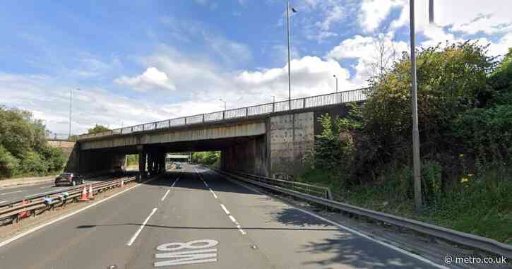 Car crashes off motorway bridge injuring two women