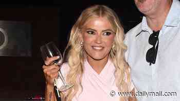 Corrie's Lucy Fallon clutches her glass of wine as she wows in a pink mini dress alongside her co-star Tina O'Brien after boozy summer bash