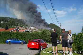 ‘Not under control’: Firefighters battle largest blaze in Norway’s history as 100 homes destroyed