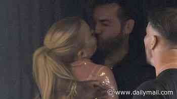 Loved-up Olivia Attwood and Pete Wicks share a steamy smooch as they're seen for the first time since hard-launching their romance