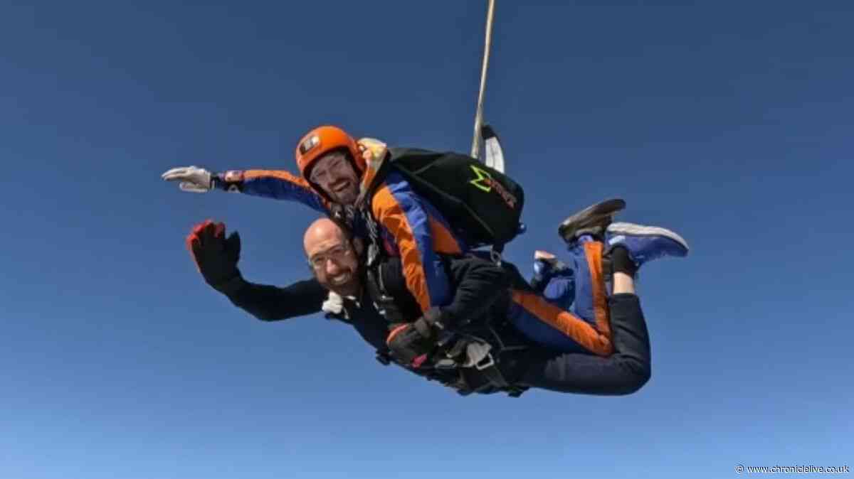 Newcastle vicar blesses cameraman at 14,000 feet on first ever skydive