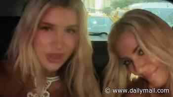 Tess Daly, 57, and her lookalike daughter Phoebe, 21, sing along to Kylie Minogue in the car as they enjoy a rare day out after she moved to New York to pursue a modelling career